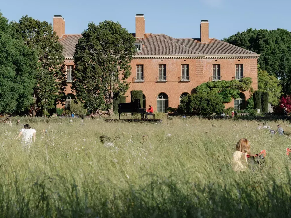 A pianist plays in the field of Filoli